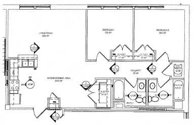 A floor plan of a house with a kitchen, living room, and two bedrooms.