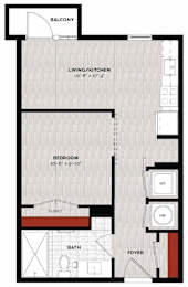 A floor plan of a small apartment with a living/kitchen area, bedroom, bathroom, closet, and foyer.