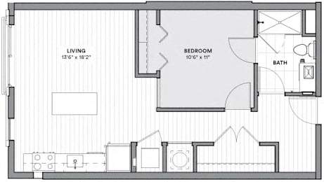 A floor plan of a small apartment with a living room, bedroom, and bathroom.
