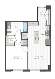 A floor plan of a small apartment with a bedroom, living area, kitchen, and bathroom.