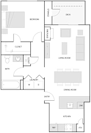A floor plan of a house with a bedroom, living room, kitchen, and dining room.