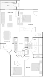 A floor plan of a house with a den, two bedrooms, a dining room, a kitchen, a laundry room, a bathroom, and a closet.