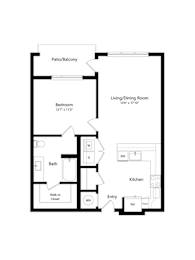 A floor plan of a small apartment with a bedroom, bathroom, kitchen, and living/dining room.