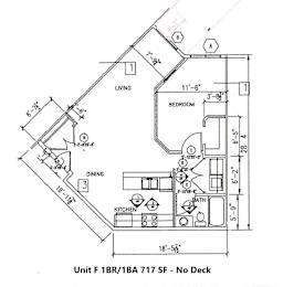 A drawing of a floor plan for a living space with a kitchen and bathroom.
