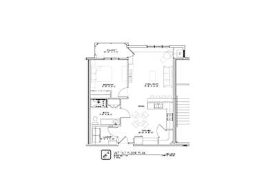 A floor plan of a house with a kitchen, living room, and two bedrooms.