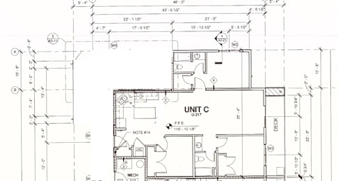 A floor plan drawing for Unit C shows a layout with labeled rooms and dimensions.