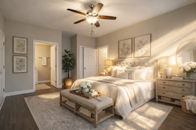 Cozy Bedroom with nightstand at Club Villas Apartments, Kathleen, Georgia
