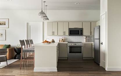 A modern kitchen with a dining table and chairs at The SoHo Luxury Apartments, Raleigh, 27603