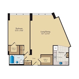 A floor plan of a house with a bedroom, living/dining area, kitchen, and bathroom.