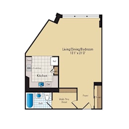 A floor plan of a small apartment with a kitchen, bathroom, and living/dining/bedroom area.