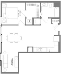 Floor Plan  A floor plan of a house with a garage on the left and a living room with a kitchen in the top right.