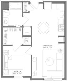 Floor Plan  A floor plan of a house with a living room, bedroom, and a workspace.