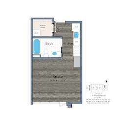 A floor plan of a studio apartment with a bath, kitchen, and walk-in closet.