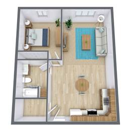 A top-down view of a living room with a couch, coffee table, and a plant.