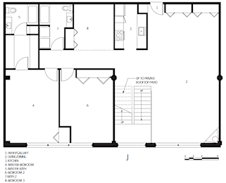 A black and white image of a house floor plan.