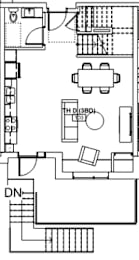 A floor plan of a room with a kitchen area, a living room, and a bathroom.