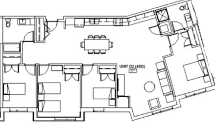 A floor plan of a residential unit with a living room, kitchen, and bedrooms.