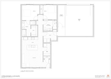 A floor plan of a building with multiple rooms and labeled areas.