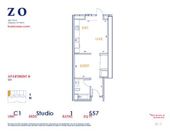 A floor plan of a studio apartment with a bed, a desk, a couch, and a kitchenette.