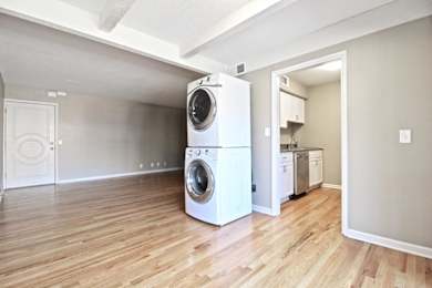 A laundry room with a washer and dryer.