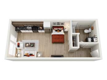A top-down view of a neatly organized model  apartment home at ION Queen Anne with a bed, a couch, a kitchenette, and a workspace.