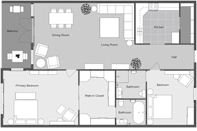 A floor plan of a house with a balcony, dining room, living room, kitchen, hall, and multiple bedrooms and bathrooms.