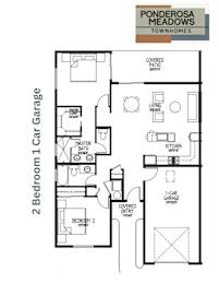 A floor plan for a Ponderosa Meadows townhome with two bedrooms and a garage.