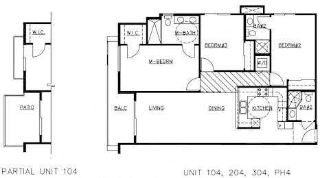 A floor plan of a residential unit showing a living area, kitchen, and bedrooms.