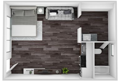 A small room with a bed, a desk, and a chair.