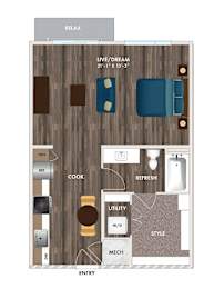 A floor plan of a room with a bed, a couch, a desk, and a chair.