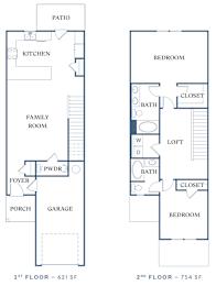 a floor plan of a two story house with a garage a kitchen and a living room