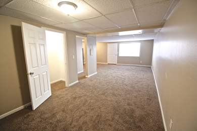 Floor Plan  A room with carpeted floor and white walls.