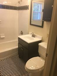 Light in bathroom with sink at Rivercrest Apartments, Piscataway