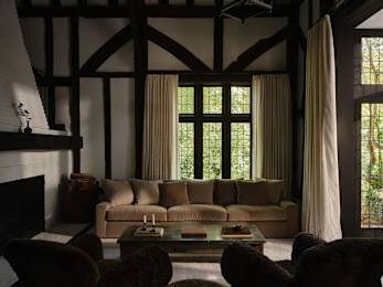 a living room with a couch and a coffee table