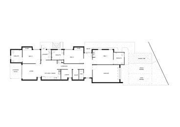 Floor Plan  A floor plan of a house with a living room, two kitchens, two bathrooms, a garage, and a laundry room.
