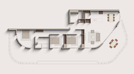 A floor plan of a building with multiple rooms and a courtyard.