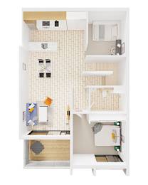 A white kitchen with a sink and a fridge.