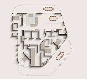A floor plan of a building with multiple rooms and corridors.