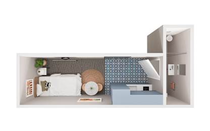 A white bedroom with a bed, pillow, and a plant.