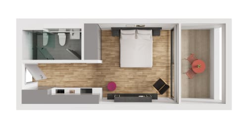a studio apartment with a bedroom and a living room