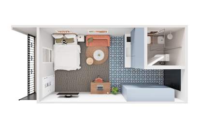 A small bedroom with a bed, desk, and chair.