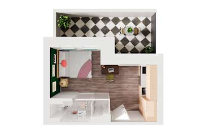 A white and black checkered wall with a green plant on top.
