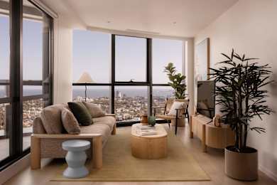 A modern living room with a view of the city.