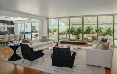 Floor Plan  a living room filled with furniture and a large window
