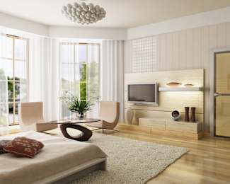 a bedroom with a bed and a tv