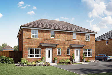 A red brick house with a white door and windows.