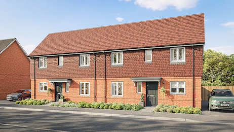 A red brick house with a green car parked in front.
