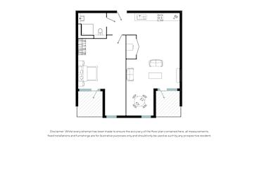 a floor plan of a house with a bedroom and a living room