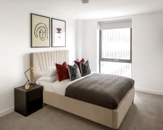 Floor Plan  a bedroom with a bed and a large window