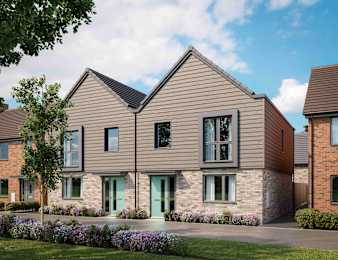 A modern house with a grey front and a green door at The Foundry Apartments, Bordon
